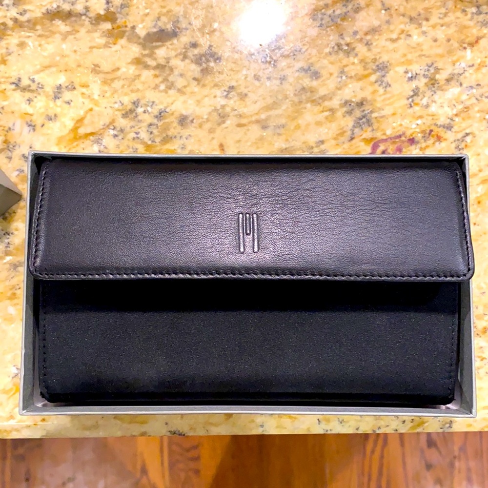 NEVER USED AUTHENIC black Missoni wallet. Made in Italy. Leather flap